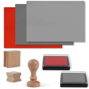 Láminas de caucho de alta densidad en color gris, diseñadas para ser grabadas con láser sin emitir olores tóxicos excesivos